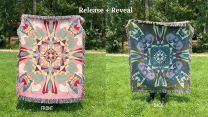Front and back of a pink and red colorful kaleidoscope patterned woven blanket with the back more blues and greens