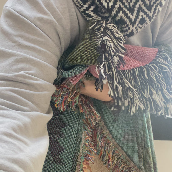 Video of Mackenzie showing woven blanket